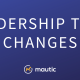 A dark blue background gradient with 'Leadership Team Changes' in large white text with the Mautic logo at the bottom in the middle.