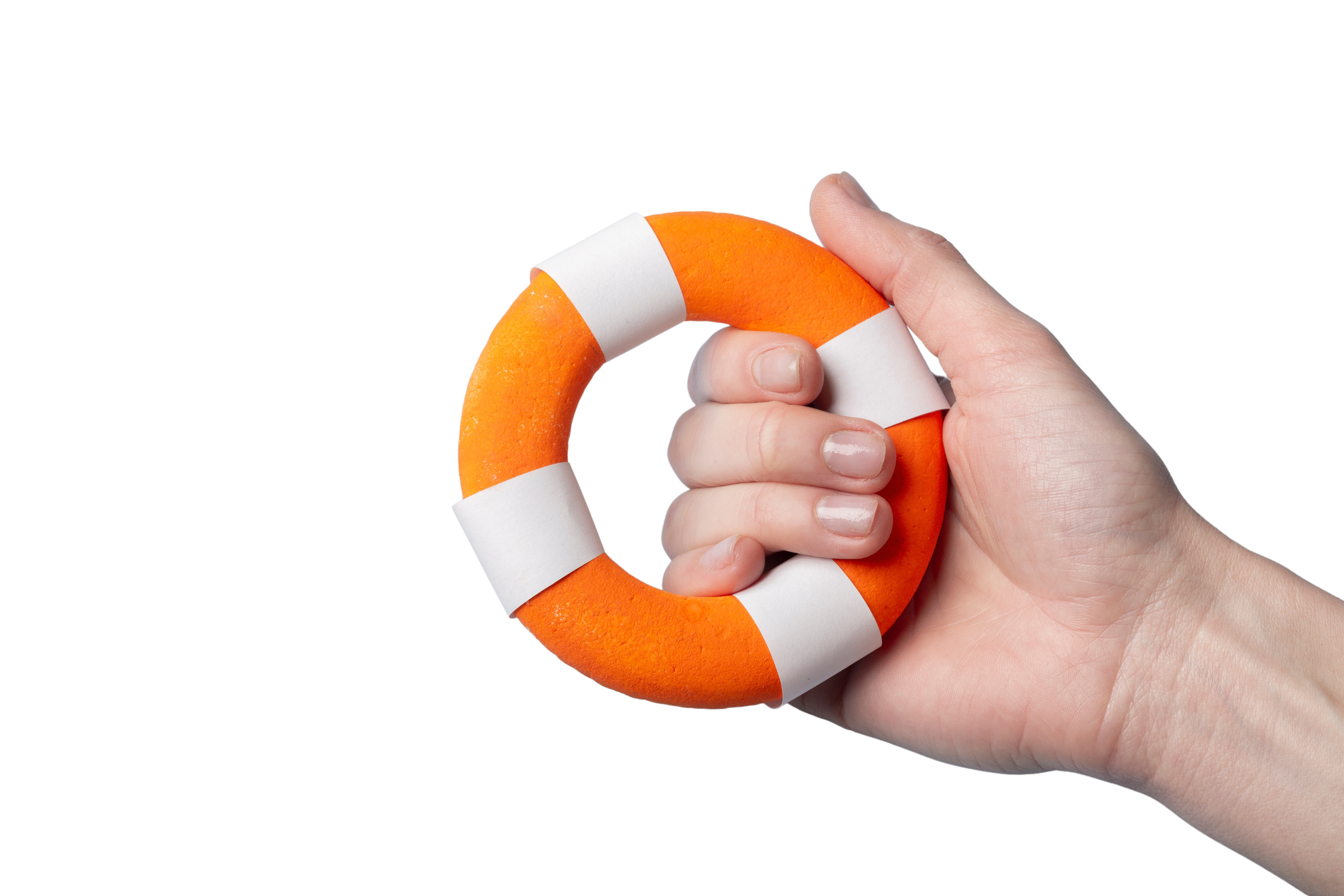 Photo of a hand holding a lifering on a white background