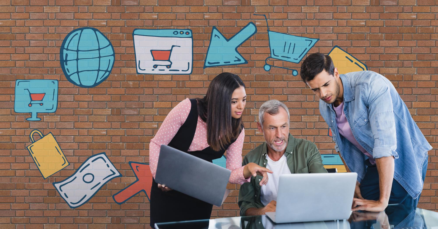 Photo of three people gathered around a laptop with illustrated icons superimposed on the red brick wall behind them representing stages of the buyer journey