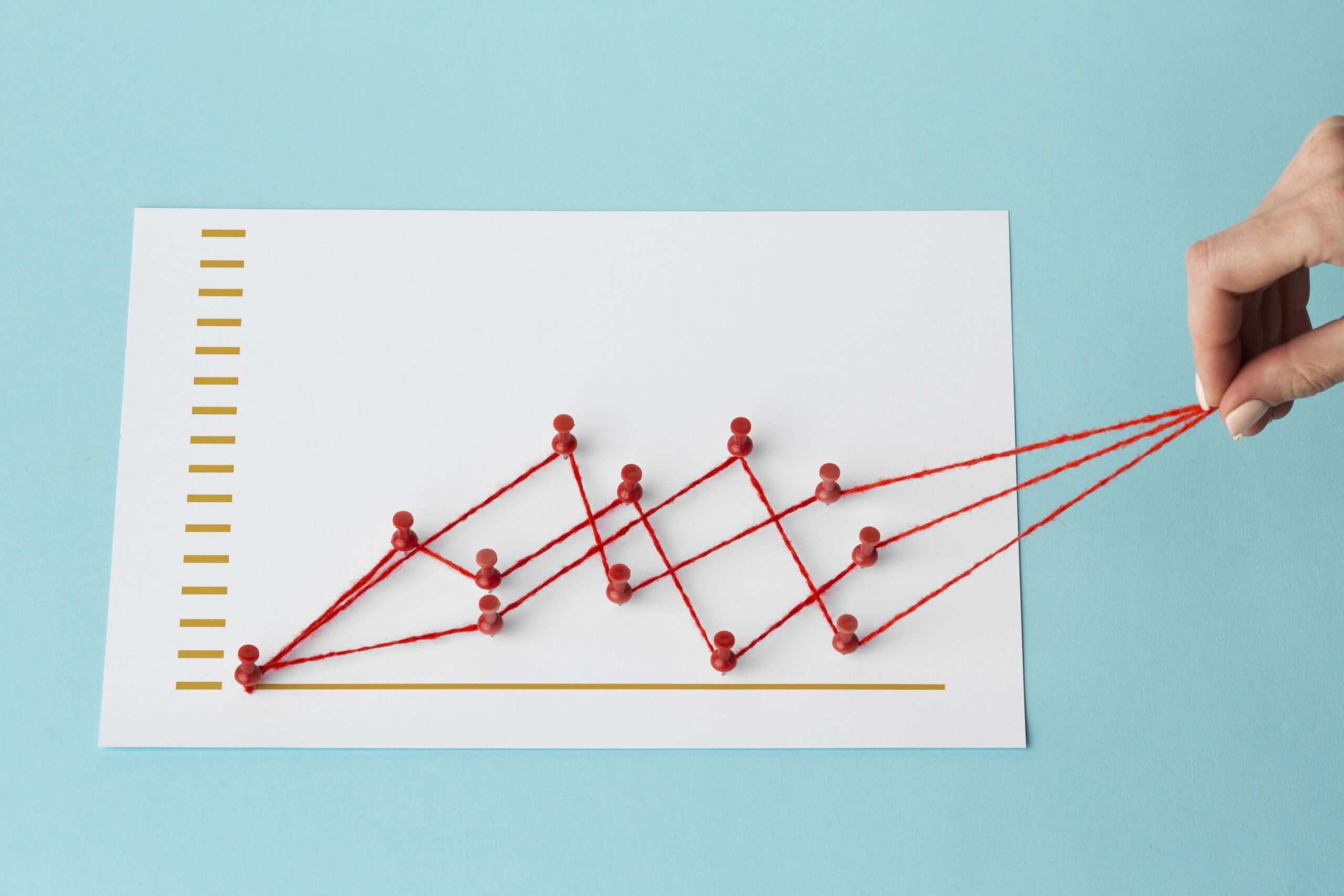 high angle chart statistics presentation with hand scaled