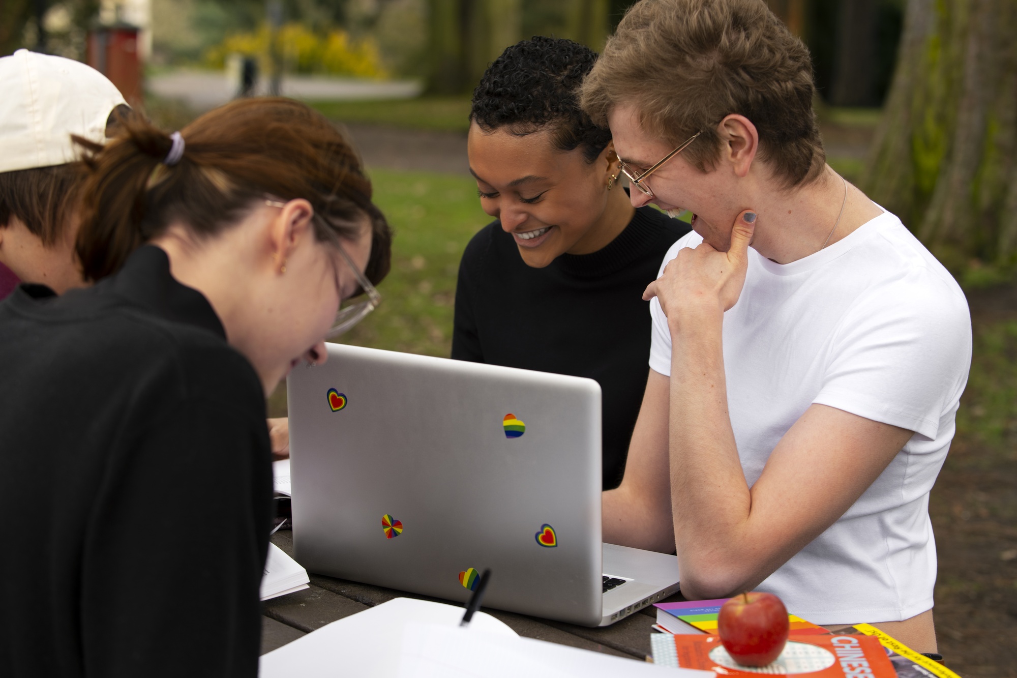 side view queer students outdoors