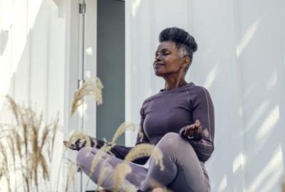 Photo of a woman doing yoga outside