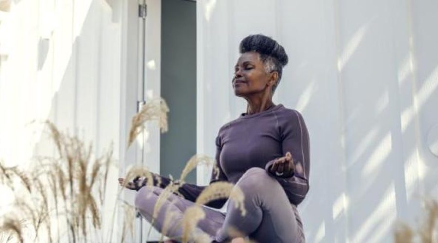 Photo of a woman doing yoga outside