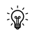 Icon of an illuminated lightbulb.